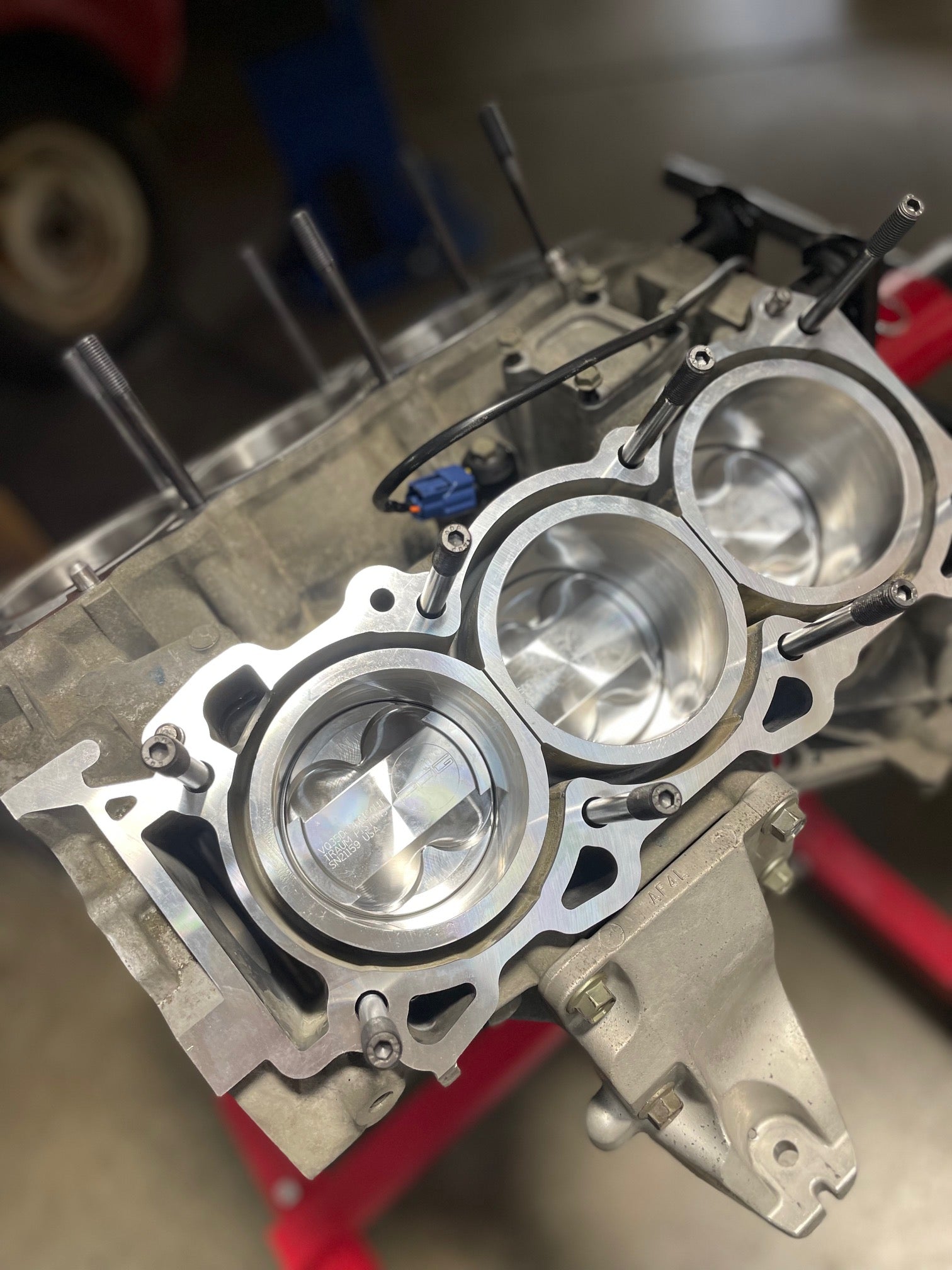 VQ35 engine block with forged pistons, arp studs